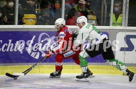 EBEL. Eishockey Bundesliga. KAC gegen	HK SZ Olimpija.Manuel Geier, (KAC),  Kristjan Cepon  (Olimpija). Klagenfurt, am 17.12.2021.
Foto: Kuess
www.qspictures.net

---
pressefotos, pressefotografie, kuess, qs, qspictures, sport, bild, bilder, bilddatenbank