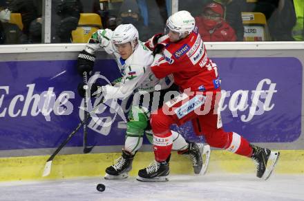 EBEL. Eishockey Bundesliga. KAC gegen	HK SZ Olimpija. Lukas Haudum,  (KAC),  Jaka Sodja (Olimpija). Klagenfurt, am 17.12.2021.
Foto: Kuess
www.qspictures.net

---
pressefotos, pressefotografie, kuess, qs, qspictures, sport, bild, bilder, bilddatenbank