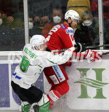 EBEL. Eishockey Bundesliga. KAC gegen	HK SZ Olimpija. Paul Postma, Daniel  (KAC),  Wade Murphy (Olimpija). Klagenfurt, am 17.12.2021.
Foto: Kuess
www.qspictures.net

---
pressefotos, pressefotografie, kuess, qs, qspictures, sport, bild, bilder, bilddatenbank