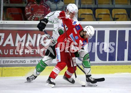 EBEL. Eishockey Bundesliga. KAC gegen	HK SZ Olimpija. Johannes Bischofberger, (KAC), Kristjan Cepon  (Olimpija). Klagenfurt, am 17.12.2021.
Foto: Kuess
www.qspictures.net

---
pressefotos, pressefotografie, kuess, qs, qspictures, sport, bild, bilder, bilddatenbank