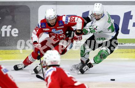 EBEL. Eishockey Bundesliga. KAC gegen	HK SZ Olimpija. Clemens Unterweger, (KAC),  Nik Simsic  (Olimpija). Klagenfurt, am 17.12.2021.
Foto: Kuess
www.qspictures.net

---
pressefotos, pressefotografie, kuess, qs, qspictures, sport, bild, bilder, bilddatenbank