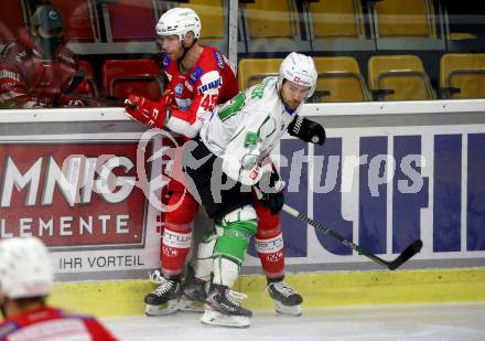 EBEL. Eishockey Bundesliga. KAC gegen	HK SZ Olimpija. Andrej Tavzelj, (KAC),  Zan Jezovsek  (Olimpija). Klagenfurt, am 17.12.2021.
Foto: Kuess
www.qspictures.net

---
pressefotos, pressefotografie, kuess, qs, qspictures, sport, bild, bilder, bilddatenbank