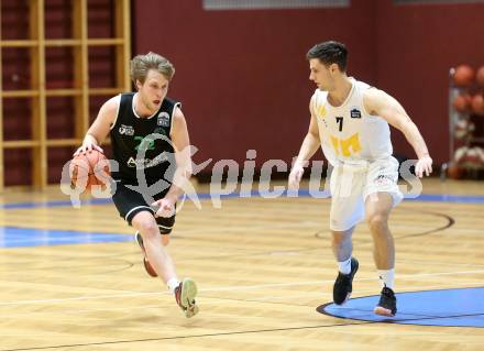 Basketball Zweite Liga 2021/2022. Grunddurchgang 10. Runde.  Woerthersee Piraten gegen Union Deutsch Wagram Alligators . Jure Bavdek  (Piraten), Marius Witzmann (Deutsch Wagram). Klagenfurt, am 18.12.2021. 
Foto: Kuess
www.qspictures.net

---
pressefotos, pressefotografie, kuess, qs, qspictures, sport, bild, bilder, bilddatenbank