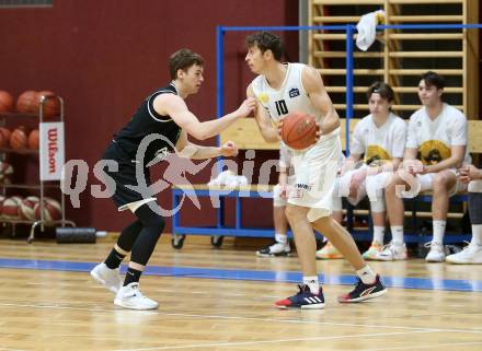 Basketball Zweite Liga 2021/2022. Grunddurchgang 10. Runde.  Woerthersee Piraten gegen Union Deutsch Wagram Alligators . Simon Finzgar  (Piraten), Jan Kvasnicka (Deutsch Wagram). Klagenfurt, am 18.12.2021. 
Foto: Kuess
www.qspictures.net

---
pressefotos, pressefotografie, kuess, qs, qspictures, sport, bild, bilder, bilddatenbank