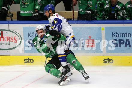 EBEL. Eishockey Bundesliga. VSV gegen HK SZ Olimpija.  Stefan Bacher,  (VSV),  Zan Jezovsek (Olimpija). Villach, am 19.12.2021.
Foto: Kuess
www.qspictures.net
---
pressefotos, pressefotografie, kuess, qs, qspictures, sport, bild, bilder, bilddatenbank