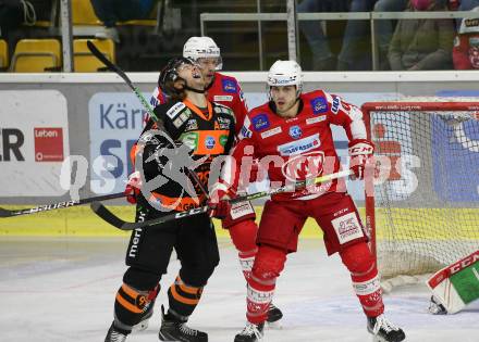 EBEL. Eishockey Bundesliga. KAC gegen	Moser Medical Graz99ers. Vallant Thomas (KAC),   Gordon Andrew (Graz). Klagenfurt, am 19.12.2021.
Foto: Kuess
www.qspictures.net

---
pressefotos, pressefotografie, kuess, qs, qspictures, sport, bild, bilder, bilddatenbank