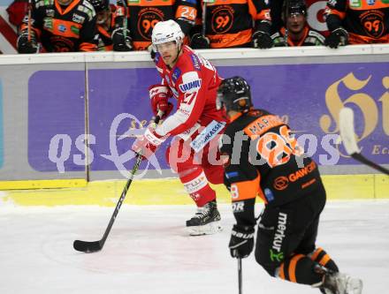 EBEL. Eishockey Bundesliga. KAC gegen	Moser Medical Graz99ers. Hundertpfund Thomas (KAC), Martin Joey  (Graz). Klagenfurt, am 19.12.2021.
Foto: Kuess
www.qspictures.net

---
pressefotos, pressefotografie, kuess, qs, qspictures, sport, bild, bilder, bilddatenbank