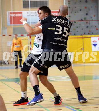 Handball. SC Ferlach gegen Baernbach/Koeflach. Mladan Jovanovic,   (SCF),  Milos Djurdjevic (Baernbach/Koeflach). Ferlach, am 18.12.2021.
Foto: Kuess
---
pressefotos, pressefotografie, kuess, qs, qspictures, sport, bild, bilder, bilddatenbank