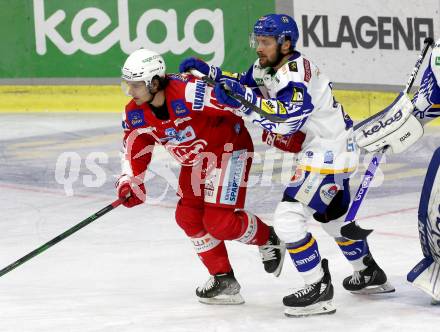 EBEL. Eishockey Bundesliga. KAC gegen	VSV. Samuel Witting, (KAC),   Nico Brunner  (VSV). Klagenfurt, am 26.12.2021.
Foto: Kuess
www.qspictures.net

---
pressefotos, pressefotografie, kuess, qs, qspictures, sport, bild, bilder, bilddatenbank