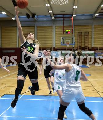 Basketball Damen Superliga 2021/2022. Grunddurchgang 9. Runde.  KOS Celovec Damen gegen  Basket Flames.  Antonia Ronacher (KOS),  Clara Kronfuss (Basket Flames). Klagenfurt, am 22.1.2022.
Foto: Kuess
www.qspictures.net
---
pressefotos, pressefotografie, kuess, qs, qspictures, sport, bild, bilder, bilddatenbank