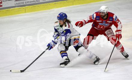 EBEL. Eishockey Bundesliga. KAC gegen	VSV. Martin Schumnig,  (KAC),   Anton Karlsson (VSV). Klagenfurt, am 25.1.2022.
Foto: Kuess
www.qspictures.net

---
pressefotos, pressefotografie, kuess, qs, qspictures, sport, bild, bilder, bilddatenbank