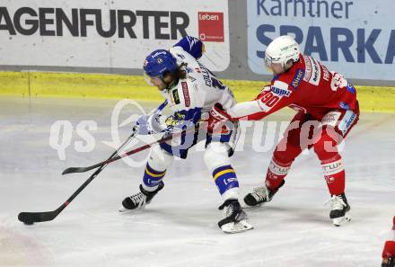 EBEL. Eishockey Bundesliga. KAC gegen	VSV.  Matthew Fraser,  (KAC),   Chris Collins (VSV). Klagenfurt, am 25.1.2022.
Foto: Kuess
www.qspictures.net

---
pressefotos, pressefotografie, kuess, qs, qspictures, sport, bild, bilder, bilddatenbank