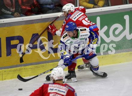 EBEL. Eishockey Bundesliga. KAC gegen	VSV.  Andrej Tavzelj, (KAC),   Scott Kosmachuk  (VSV). Klagenfurt, am 25.1.2022.
Foto: Kuess
www.qspictures.net

---
pressefotos, pressefotografie, kuess, qs, qspictures, sport, bild, bilder, bilddatenbank