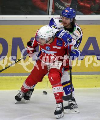 EBEL. Eishockey Bundesliga. KAC gegen	VSV. Lukas Haudum, (KAC),   Chris Collins  (VSV). Klagenfurt, am 25.1.2022.
Foto: Kuess
www.qspictures.net

---
pressefotos, pressefotografie, kuess, qs, qspictures, sport, bild, bilder, bilddatenbank