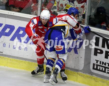 EBEL. Eishockey Bundesliga. KAC gegen	VSV. Manuel Ganahl,  (KAC),   Scott Kosmachuk (VSV). Klagenfurt, am 25.1.2022.
Foto: Kuess
www.qspictures.net

---
pressefotos, pressefotografie, kuess, qs, qspictures, sport, bild, bilder, bilddatenbank