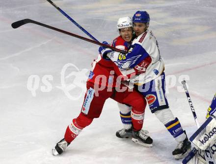 EBEL. Eishockey Bundesliga. KAC gegen	VSV. Matthew Fraser,  (KAC),   Brett Flemming (VSV). Klagenfurt, am 25.1.2022.
Foto: Kuess
www.qspictures.net

---
pressefotos, pressefotografie, kuess, qs, qspictures, sport, bild, bilder, bilddatenbank