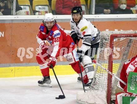 EBEL. Eishockey Bundesliga. KAC gegen	Dornbirn Bulldogs. Samuel Witting (KAC), Kevin Hancock (Dornbirn Bulldogs). Klagenfurt, am 28.1.2022.
Foto: Kuess
www.qspictures.net

---
pressefotos, pressefotografie, kuess, qs, qspictures, sport, bild, bilder, bilddatenbank