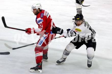 EBEL. Eishockey Bundesliga. KAC gegen	Dornbirn Bulldogs. Rok Ticar (KAC), Kevin Hancock (Dornbirn Bulldogs). Klagenfurt, am 28.1.2022.
Foto: Kuess
www.qspictures.net

---
pressefotos, pressefotografie, kuess, qs, qspictures, sport, bild, bilder, bilddatenbank