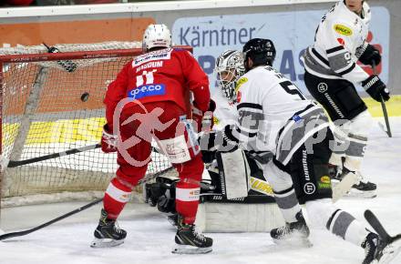 EBEL. Eishockey Bundesliga. KAC gegen	Dornbirn Bulldogs. Lukas Haudum (KAC), Davis Vandane (Dornbirn Bulldogs). Klagenfurt, am 28.1.2022.
Foto: Kuess
www.qspictures.net

---
pressefotos, pressefotografie, kuess, qs, qspictures, sport, bild, bilder, bilddatenbank