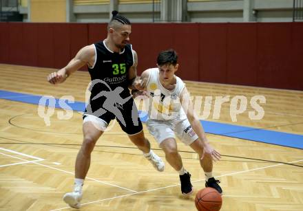 Basketball Zweite Liga 2021/2022. Grunddurchgang 14. Runde.  Woerthersee Piraten gegen Basket Flames.  Jure Bavdek (Piraten), Fabio Soehnel (Basket Flames). Klagenfurt, am 29.1.2022. 
Foto: Kuess
www.qspictures.net

---
pressefotos, pressefotografie, kuess, qs, qspictures, sport, bild, bilder, bilddatenbank