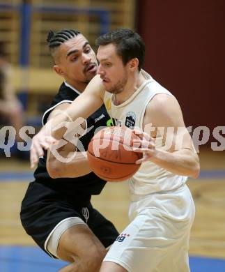 Basketball Zweite Liga 2021/2022. Grunddurchgang 14. Runde.  Woerthersee Piraten gegen Basket Flames. Jan-Arne Apschner  (Piraten),  Fabio Soehnel  (Basket Flames). Klagenfurt, am 29.1.2022. 
Foto: Kuess
www.qspictures.net

---
pressefotos, pressefotografie, kuess, qs, qspictures, sport, bild, bilder, bilddatenbank