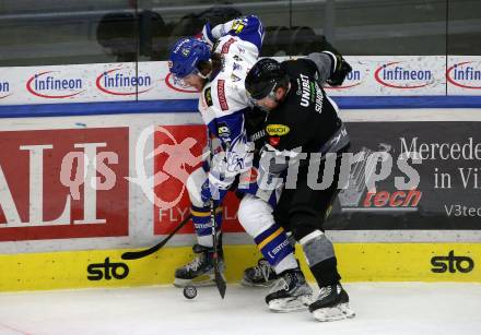 EBEL. Eishockey Bundesliga. VSV gegen Dornbirn Bulldogs.   Chris Collins, (VSV),  Teemu Petteri Suhonen  (Dornbirn). Villach, am 5.2.2022.
Foto: Kuess
www.qspictures.net
---
pressefotos, pressefotografie, kuess, qs, qspictures, sport, bild, bilder, bilddatenbank