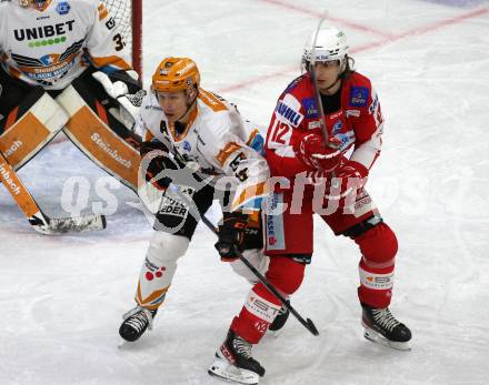 EBEL. Eishockey Bundesliga. KAC gegen	Steinbach Black Wings Linz. David Maier, (KAC), Gerd Kragl   (Linz). Klagenfurt, am 8.2.2022.
Foto: Kuess
www.qspictures.net

---
pressefotos, pressefotografie, kuess, qs, qspictures, sport, bild, bilder, bilddatenbank