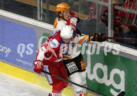 EBEL. Eishockey Bundesliga. KAC gegen	Steinbach Black Wings Linz. Nikolaus Kraus, (KAC),  Laurin Mueller  (Linz). Klagenfurt, am 8.2.2022.
Foto: Kuess
www.qspictures.net

---
pressefotos, pressefotografie, kuess, qs, qspictures, sport, bild, bilder, bilddatenbank