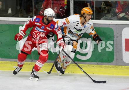 EBEL. Eishockey Bundesliga. KAC gegen	Steinbach Black Wings Linz. Martin Schumnig, (KAC), Brian Lebler   (Linz). Klagenfurt, am 8.2.2022.
Foto: Kuess
www.qspictures.net

---
pressefotos, pressefotografie, kuess, qs, qspictures, sport, bild, bilder, bilddatenbank