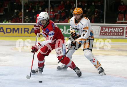 EBEL. Eishockey Bundesliga. KAC gegen	Steinbach Black Wings Linz. Manuel Ganahl,  (KAC),  Raphael Wolf (Linz). Klagenfurt, am 8.2.2022.
Foto: Kuess
www.qspictures.net

---
pressefotos, pressefotografie, kuess, qs, qspictures, sport, bild, bilder, bilddatenbank