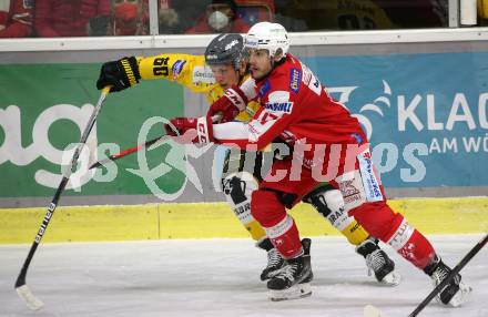 EBEL. Eishockey Bundesliga. KAC gegen	HC Pustertal Woelfe. Manuel Ganahl,  (KAC), Shane Robert Hanna  (Pustertal). Klagenfurt, am 13.2.2022.
Foto: Kuess
www.qspictures.net

---
pressefotos, pressefotografie, kuess, qs, qspictures, sport, bild, bilder, bilddatenbank