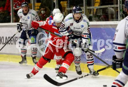 EBEL. Eishockey Bundesliga. KAC gegen	Hydro Fehervar AV 19. Daniel Obersteiner,  (KAC), Joshua Atkinson  (Fehervar). Klagenfurt, am 18.2.2022.
Foto: Kuess
www.qspictures.net

---
pressefotos, pressefotografie, kuess, qs, qspictures, sport, bild, bilder, bilddatenbank