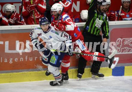 EBEL. Eishockey Bundesliga. KAC gegen	Hydro Fehervar AV 19. Andrej Tavzelj,  (KAC),  Csanad Erdely (Fehervar). Klagenfurt, am 18.2.2022.
Foto: Kuess
www.qspictures.net

---
pressefotos, pressefotografie, kuess, qs, qspictures, sport, bild, bilder, bilddatenbank