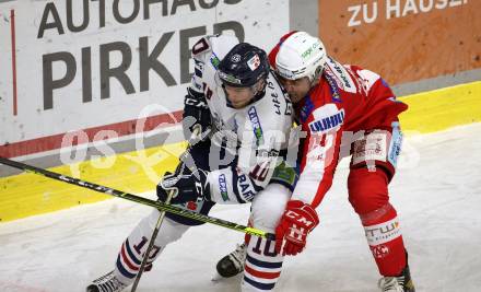 EBEL. Eishockey Bundesliga. KAC gegen	Hydro Fehervar AV 19. Fabian Hochegger, (KAC),  Istvan Bartalis   (Fehervar). Klagenfurt, am 18.2.2022.
Foto: Kuess
www.qspictures.net

---
pressefotos, pressefotografie, kuess, qs, qspictures, sport, bild, bilder, bilddatenbank