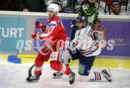 EBEL. Eishockey Bundesliga. KAC gegen	Hydro Fehervar AV 19. Lukas Haudum,  (KAC),  Istvan Bartalis (Fehervar). Klagenfurt, am 18.2.2022.
Foto: Kuess
www.qspictures.net

---
pressefotos, pressefotografie, kuess, qs, qspictures, sport, bild, bilder, bilddatenbank