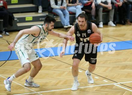 Basketball 2. Liga 2021/2022. Grunddurchgang 15. Runde.  KOS Celovec gegen  Woerthersee Piraten.  Marin Sliskovic (KOS),  Maximilian Kunovjanek (Piraten). Klagenfurt, am 25.2.2022.
Foto: Kuess
www.qspictures.net
---
pressefotos, pressefotografie, kuess, qs, qspictures, sport, bild, bilder, bilddatenbank