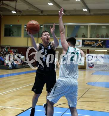 Basketball 2. Liga 2021/2022. Grunddurchgang 15. Runde.  KOS Celovec gegen  Woerthersee Piraten. Marin Sliskovic  (KOS),  Jan-Arne Apschner (Piraten). Klagenfurt, am 25.2.2022.
Foto: Kuess
www.qspictures.net
---
pressefotos, pressefotografie, kuess, qs, qspictures, sport, bild, bilder, bilddatenbank