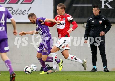 Fussball Bundesliga. SK Austria Klagenfurt gegen SV Guntamatic Ried.  Turgay Gemicibasi,  (Klagenfurt), Marcel Ziegl  (Ried). Klagenfurt, am 27.2.2022.
Foto: Kuess
www.qspictures.net
---
pressefotos, pressefotografie, kuess, qs, qspictures, sport, bild, bilder, bilddatenbank