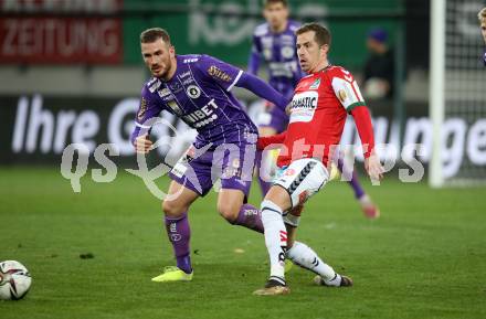 Fussball Bundesliga. SK Austria Klagenfurt gegen SV Guntamatic Ried.  Turgay Gemicibasi,  (Klagenfurt), Stefan Nutz  (Ried). Klagenfurt, am 27.2.2022.
Foto: Kuess
www.qspictures.net
---
pressefotos, pressefotografie, kuess, qs, qspictures, sport, bild, bilder, bilddatenbank