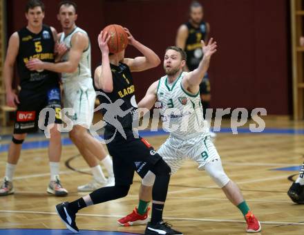 Basketball 2. Liga 2021/2022. Grunddurchgang 17. Runde.  KOS Celovec gegen  Guessing/Jennersdorf Blackbirds.  Tim Huber (KOS),  Bernhard Koch (Blackbirds). Klagenfurt, am 27.2.2022.
Foto: Kuess
www.qspictures.net
---
pressefotos, pressefotografie, kuess, qs, qspictures, sport, bild, bilder, bilddatenbank