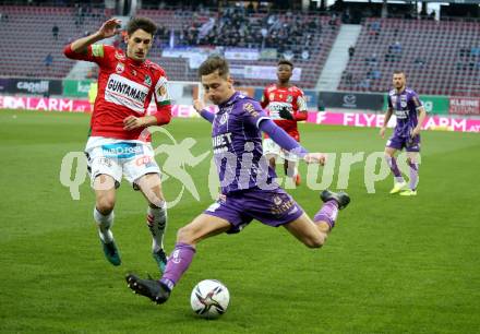 Fussball Bundesliga. SK Austria Klagenfurt gegen SV Guntamatic Ried.  Till Schumacher,  (Klagenfurt),  Ante Bajic (Ried). Klagenfurt, am 27.2.2022.
Foto: Kuess
www.qspictures.net
---
pressefotos, pressefotografie, kuess, qs, qspictures, sport, bild, bilder, bilddatenbank