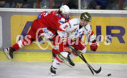 EBEL. Eishockey Bundesliga. KAC gegen	HCB Suedtirol Alperia. David Maier,  (KAC),  Michael Halmo (Bozen). Klagenfurt, am 2.3.2022.
Foto: Kuess
www.qspictures.net

---
pressefotos, pressefotografie, kuess, qs, qspictures, sport, bild, bilder, bilddatenbank