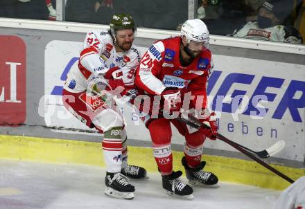 EBEL. Eishockey Bundesliga. KAC gegen	HCB Suedtirol Alperia. Steven Strong,  (KAC),  Brett Findlay (Bozen). Klagenfurt, am 2.3.2022.
Foto: Kuess
www.qspictures.net

---
pressefotos, pressefotografie, kuess, qs, qspictures, sport, bild, bilder, bilddatenbank