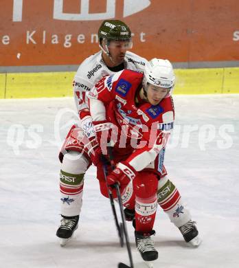 EBEL. Eishockey Bundesliga. KAC gegen	HCB Suedtirol Alperia. Nikolaus Kraus,  (KAC),  Michael Halmo (Bozen). Klagenfurt, am 2.3.2022.
Foto: Kuess
www.qspictures.net

---
pressefotos, pressefotografie, kuess, qs, qspictures, sport, bild, bilder, bilddatenbank