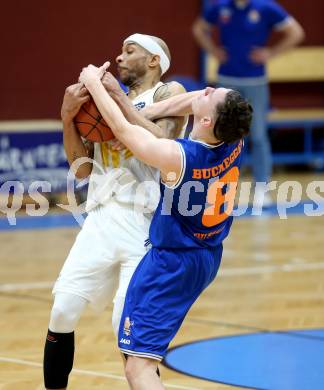 Basketball Zweite Liga 2021/2022. Grunddurchgang 18. Runde.  Woerthersee Piraten gegen 	BBU Salzburg.  Shawn Ray (Piraten),  Thomas Buchegger  (Salzburg). Klagenfurt, am 5.3.2022. 
Foto: Kuess
www.qspictures.net

---
pressefotos, pressefotografie, kuess, qs, qspictures, sport, bild, bilder, bilddatenbank