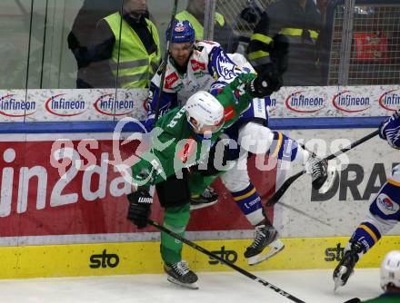 EBEL. Eishockey Bundesliga. VSV gegen HK SZ Olimpija Ljubljana. Rick Schofield,  (VSV), Mitja Robar   (Laibach). Villach, am 9.3.2022.
Foto: Kuess
www.qspictures.net
---
pressefotos, pressefotografie, kuess, qs, qspictures, sport, bild, bilder, bilddatenbank