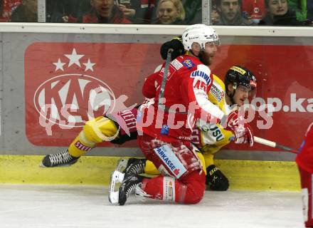 EBEL. Eishockey Bundesliga. KAC gegen	spusu Vienna Capitals. Andrej Tavzelj,  (KAC), Simeon Schwinger  (Vienna Capitals). Klagenfurt, am 11.3.2022.
Foto: Kuess
www.qspictures.net

---
pressefotos, pressefotografie, kuess, qs, qspictures, sport, bild, bilder, bilddatenbank