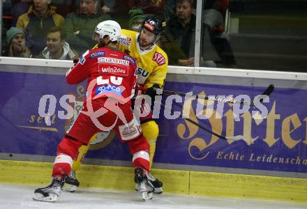 EBEL. Eishockey Bundesliga. KAC gegen	spusu Vienna Capitals.  Martin Schumnig, (KAC), James Sheppard   (Vienna Capitals). Klagenfurt, am 11.3.2022.
Foto: Kuess
www.qspictures.net

---
pressefotos, pressefotografie, kuess, qs, qspictures, sport, bild, bilder, bilddatenbank