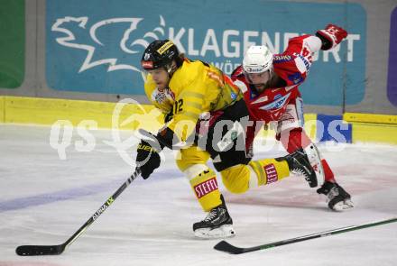 EBEL. Eishockey Bundesliga. KAC gegen	spusu Vienna Capitals.  Steven Strong,  (KAC), Nicolai Meyer  (Vienna Capitals). Klagenfurt, am 11.3.2022.
Foto: Kuess
www.qspictures.net

---
pressefotos, pressefotografie, kuess, qs, qspictures, sport, bild, bilder, bilddatenbank