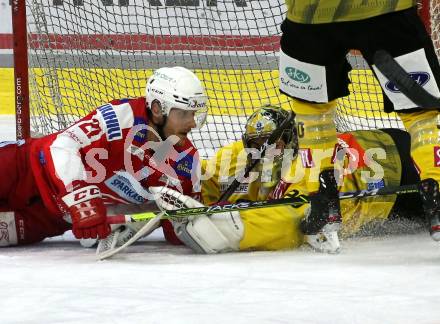 EBEL. Eishockey Bundesliga. KAC gegen	spusu Vienna Capitals. Manuel Geier,  (KAC), Bernhard Starkbaum  (Vienna Capitals). Klagenfurt, am 11.3.2022.
Foto: Kuess
www.qspictures.net

---
pressefotos, pressefotografie, kuess, qs, qspictures, sport, bild, bilder, bilddatenbank